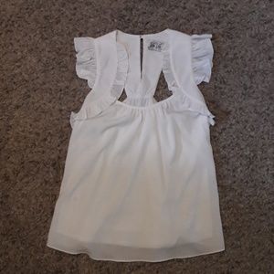 White sleeveless ruffled soft flow top